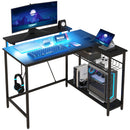 HOMCOM L Shaped Desk With LED Lights Reversible Corner Gaming Desk With Storage
