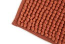 Noodle Soft Touch Non-Slip Bathroom Rug in Burnt Orange