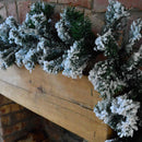 Premier 2.7m Snow Flocked Pine Christmas Garland with Glitter Finish