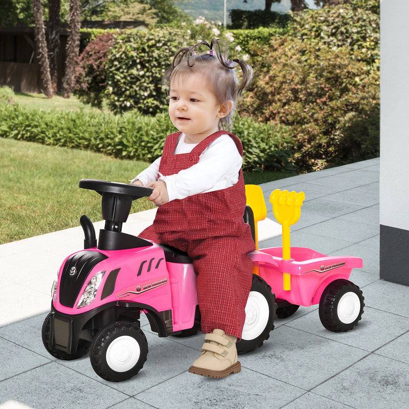 Pink tractor ride best sale on toy