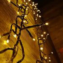 960 LED 12.4m Premier Cluster Indoor Outdoor Multi Function Mains Operated Christmas Lights with Timer on Clear Cable in Warm White