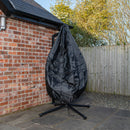 Samuel Alexander Hanging Garden Rattan Egg Chair with Steel Frame and Waterproof Cover in Indigo